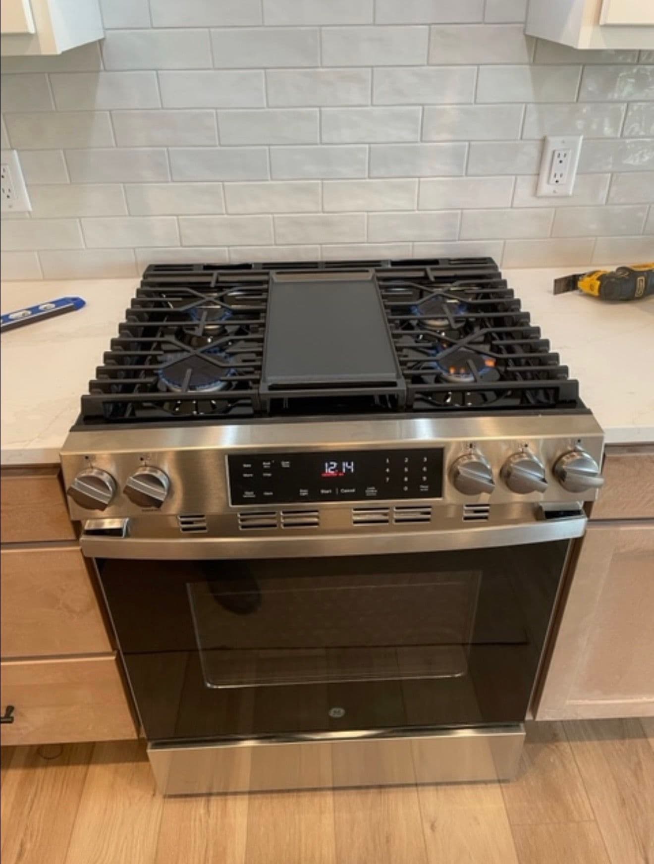 Gallery photos for GE Gas Range, Hood Insert, and Dishwasher Install Done Right: Image #1
