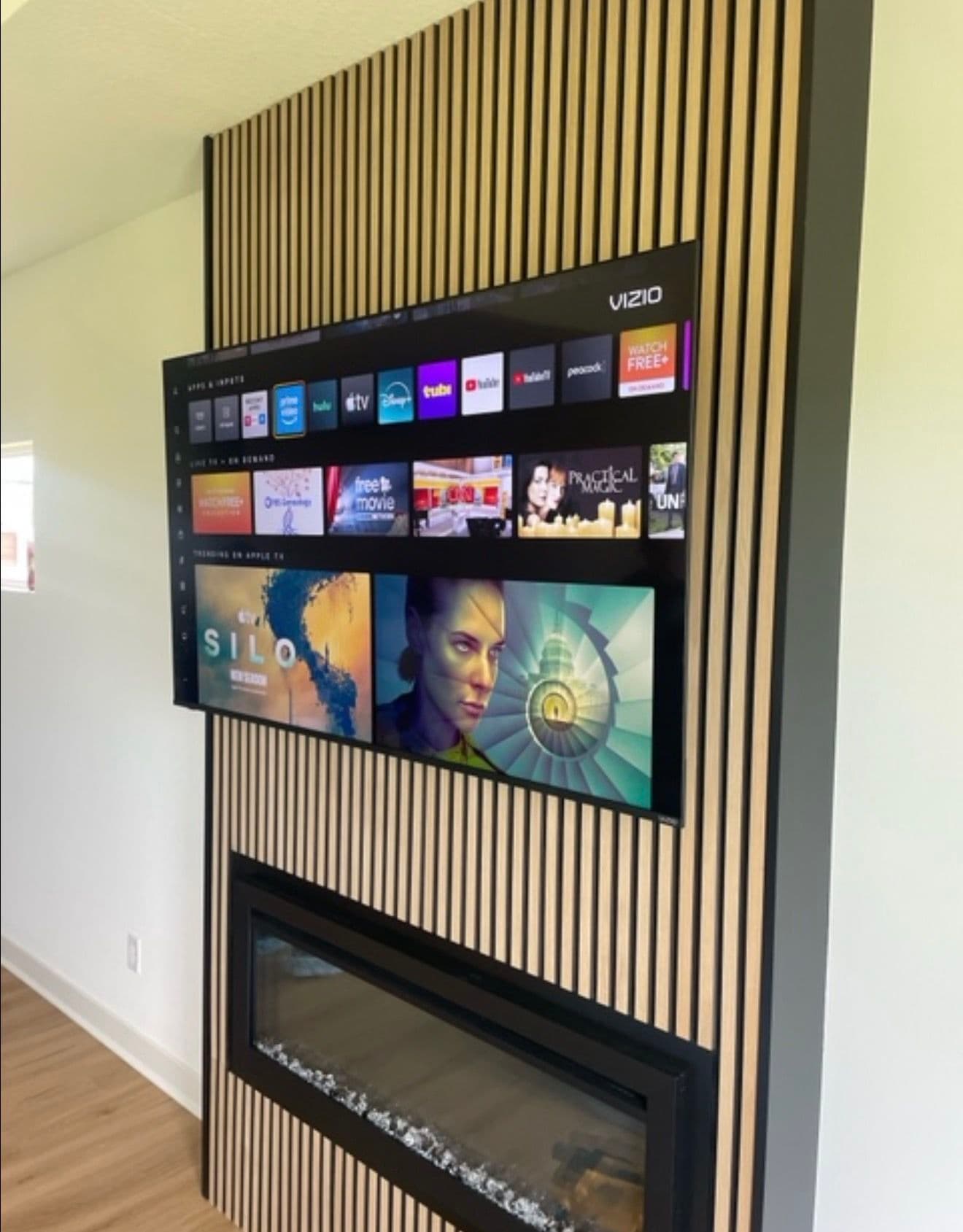 65-Inch TV Mount Over the Fireplace Done Right image