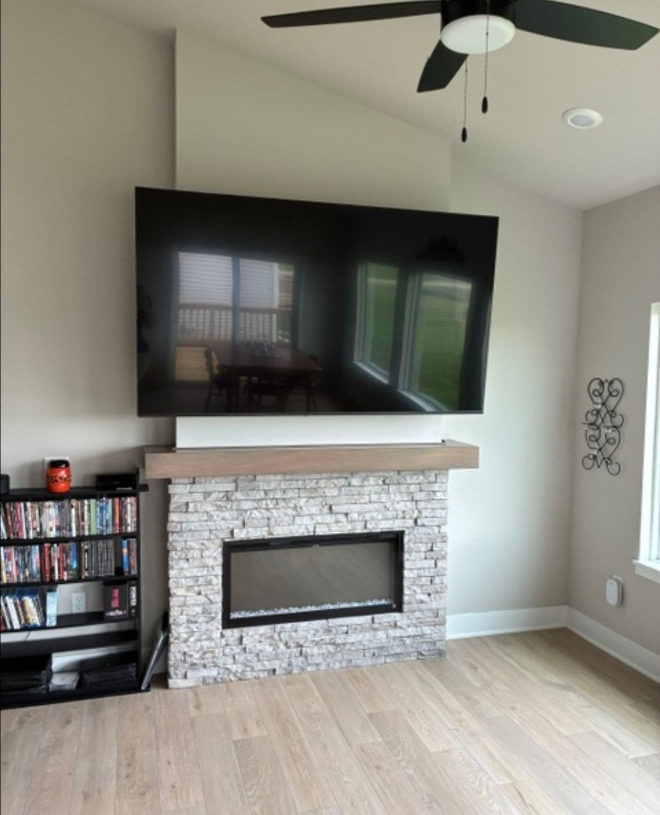 Full-Motion TV Mount Over a Fireplace Done Right image