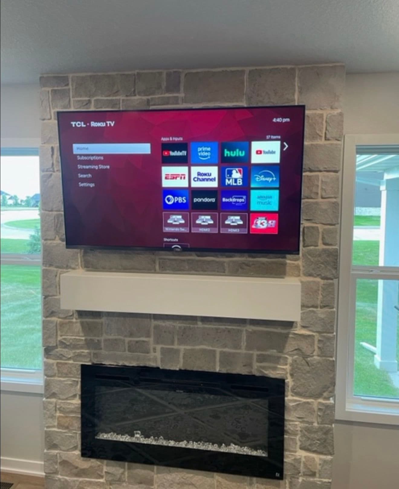 65-Inch TV Mount Over Stone Fireplace in Ankeny image
