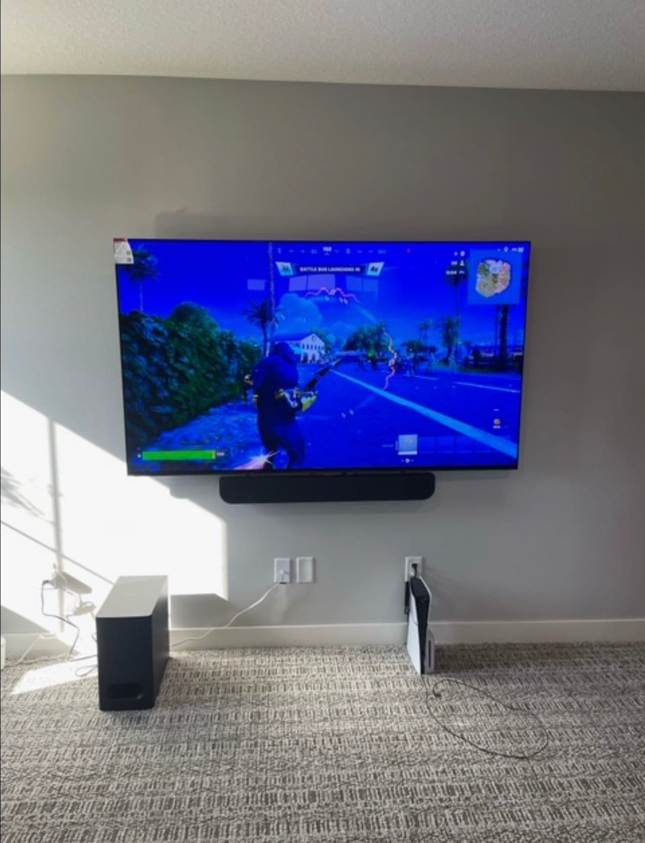 Basement Gaming Setup with TV and Sound Bar Install image