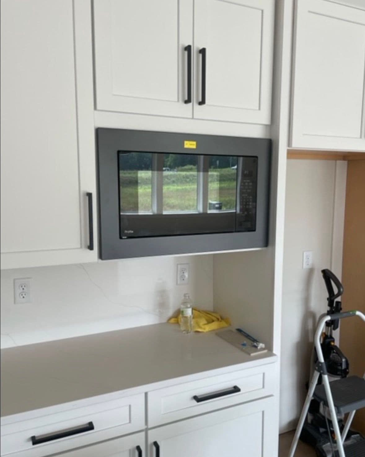 Gallery photos for Matte Black Appliances Installed in a Fresh White Kitchen: Image #2
