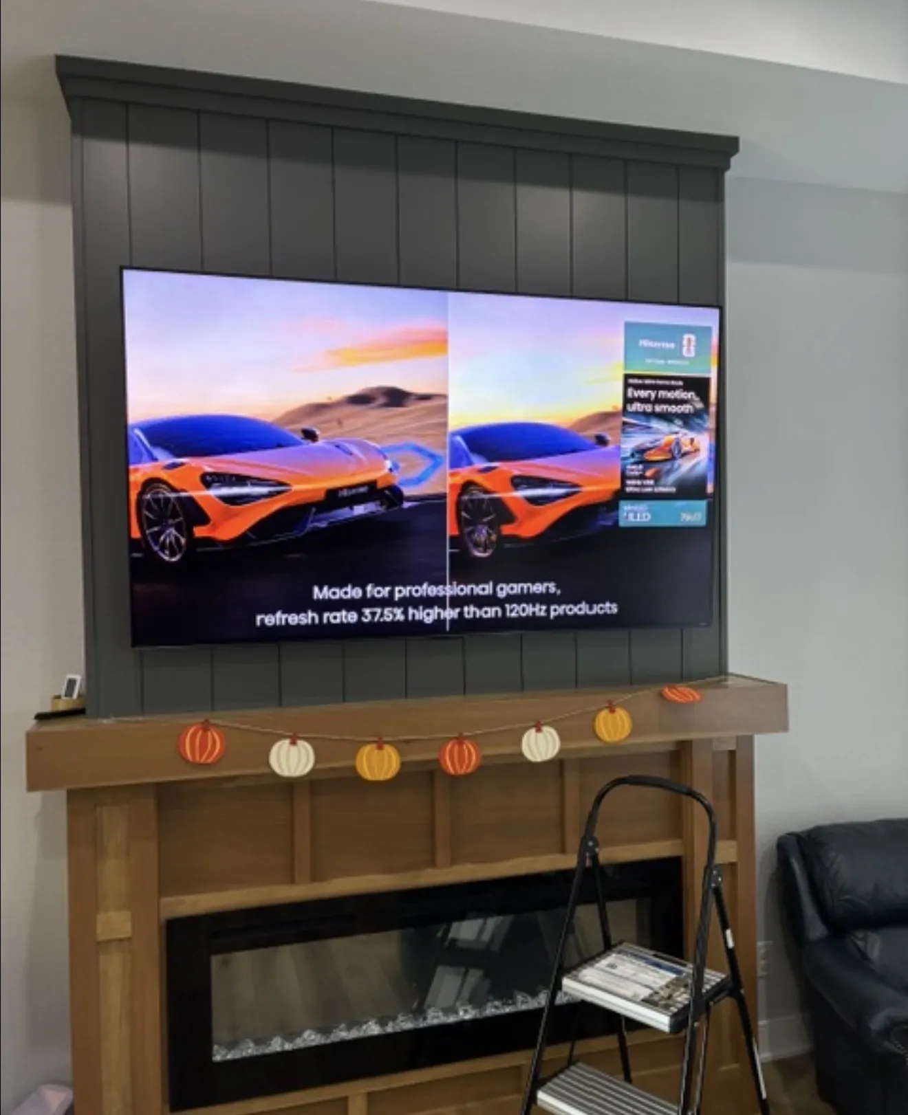 75" TV Mounted Over a Fireplace in Urbandale image