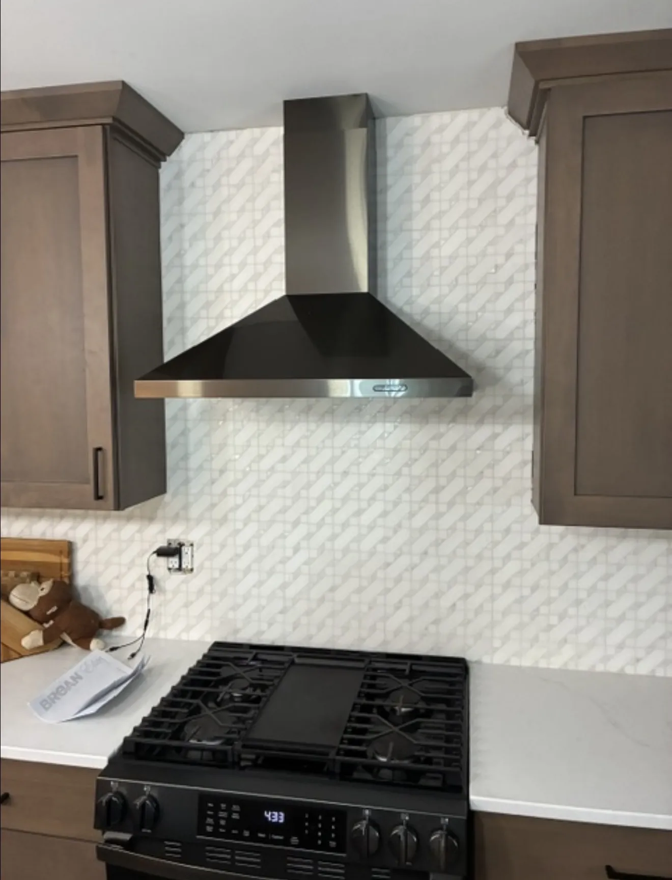 Kitchen Appliance Install After Water Damage Brings a Home Back to Life image